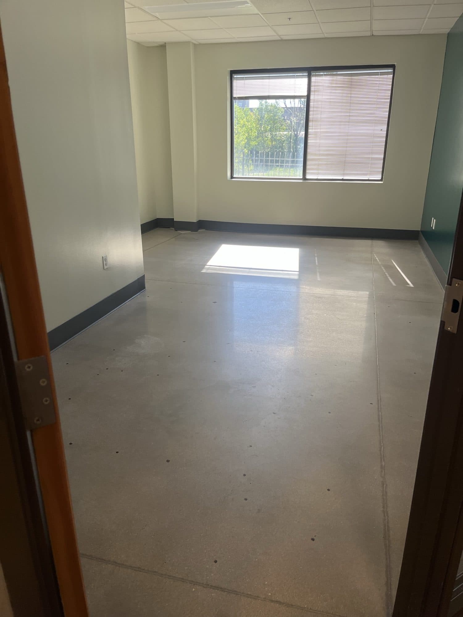 Office 3 — corner room with a wide window